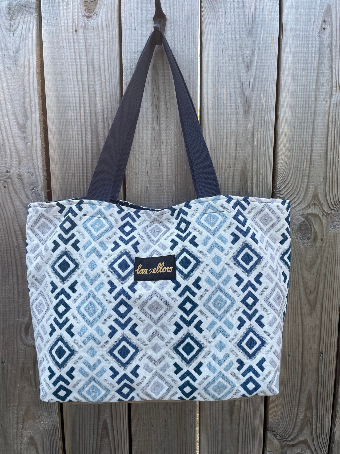 Tas blauw-wit met drukknoop